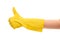 Close up of female hand in yellow protective rubber glove showing thumbs up sign