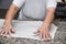 Close up of female hands kneading dough and making banitsa