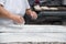 Close up of female hands kneading dough and making banitsa