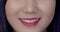 Close up female lip with genuine smile