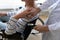 Close up of female nurse supporting senior lady patient