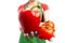 Close-up female retail employee hands holding red vegetables