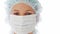 Close up of female surgeon wearing surgical mask