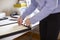 Close Up Of Female Teenage Artist Framing Picture In Studio