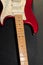 Close up of a Fender Stratocaster USA electric guitar in the color red