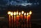 Close-up of festive burning wax candles that are traditional symbols of Hanukkah Holiday of Light