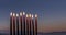 Close-up of festive burning wax candles that are traditional symbols of Hanukkah Holiday of Light