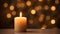 Close up of festive christmas candle with smooth bokeh background