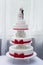 Close-up of figurine couple on wedding cake at the park