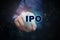 Close up finger pointing into the ipo text with initial public o