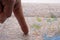 Close up of finger pointing to Houston, Texas on colorful map with selective focus, shallow depth of field, background