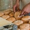 Close up finished pink dough in the bakery on wooden table. Working process. Private bakery. Production of bread