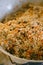 Close-up of the finished Uzbek pilaf in the azan. The texture of rice, meat and carrots.