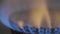Close-up of a fire in a gas stoker on a gas stove