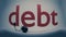 Close up fish-eye of red debt text