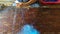 Close up of fisherman hands weaving net at the desk. top view ,overhead shot