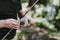 Close up of fishing baits in hands of an angler