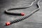 Close up of fitness battle ropes lie on black floor in fitness gym. Sport and fitness equipment. Functional training