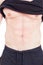 Close-up with fitness instructor male torso and abs