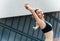 Close up of a fitness woman doing warm up exercises