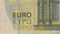 Close-up of a five euro note. Stop motion.