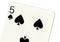 Close up of a five of spades playing card.