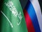 Close-up of the flags of Saudi Arabia and Russia.