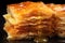 close-up of flaky, golden layers in a baklava piece