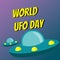 Close-up flying saucers in the sky and text World UFO Day. Vector greeting card.
