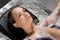 Close-up foam peeling massage for model in spa. Relaxation in Turkish hammam