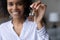 Close up focus on keys in African American woman hand