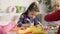 Close up of focused children preparing easter decorations