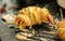 Close up food photo of fried tiger prawns in egg noodles on black slate background. Asian culture and cuisine. Food image of shrim