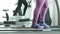 Close up Foot Fitness Asian woman running  on treadmill and other excercise on Horizontal Elliptical cross