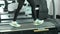 Close up Foot Fitness Asian woman start walking to running warm up on track treadmill machine