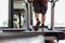 Close up foot sneakers Fitness man running on track treadmill, Man with muscular legs in exercise gym