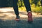 Close up foot women run feet on road in workout wellness