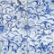 close up of four square traditional Tobeyaki white ceramic tiles with indigo blue floral patterns and dragonflies background