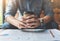 Close up Freelance or business man hands holding cup of coffee.