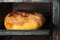 Close-up of fresh artisanal bread baked in the oven in cooking and eating concept. Homemade pastry or Ukrainian national dis