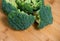 Close up on Fresh broccoli solated on wooden background