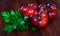 Close-up of fresh brown tomatoes on wooden surface