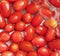 Close-up fresh cherry tomato soaking in the water