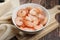 close up of fresh cooked large shrimp in a bowl