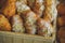 Close-up of fresh croissants, powdered sugar and puffs