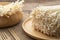 Close up fresh golden needle mushroom or enoki, enokitake Flammulina velutipes in wooden plate