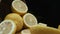 Close up of fresh lemon slices are arranged against a rustic basket. Comestible.