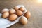 Close up of fresh organic chicken eggs from local farmer market on tablecloth, selective focus. World egg day and