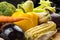 Close-up of fresh organic vegetables on rustic wood table. Local