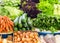 Close up of fresh, organic vegetables for sale at market. Beetroot, carrot, lettuce, cabbage, cucumber, zucchini, onions